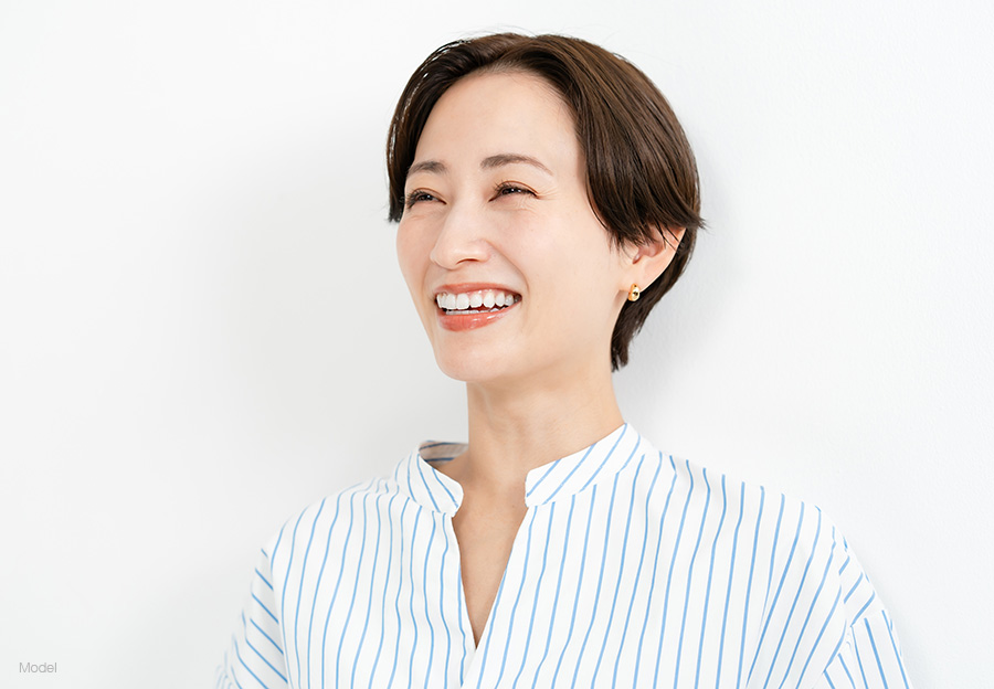 Mature woman with short hair smiling