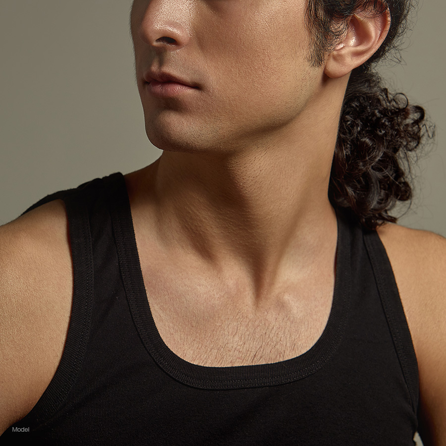 Young man in a black muscle shirt
