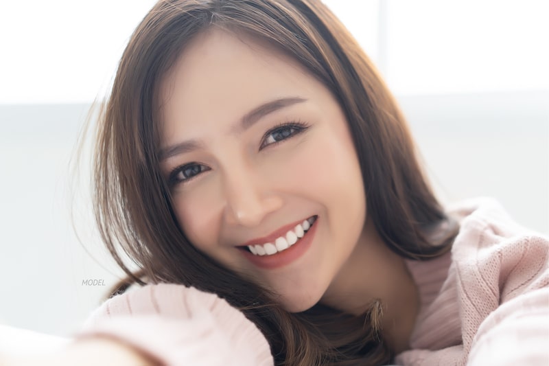 Young, beautiful, Asian woman smiling
